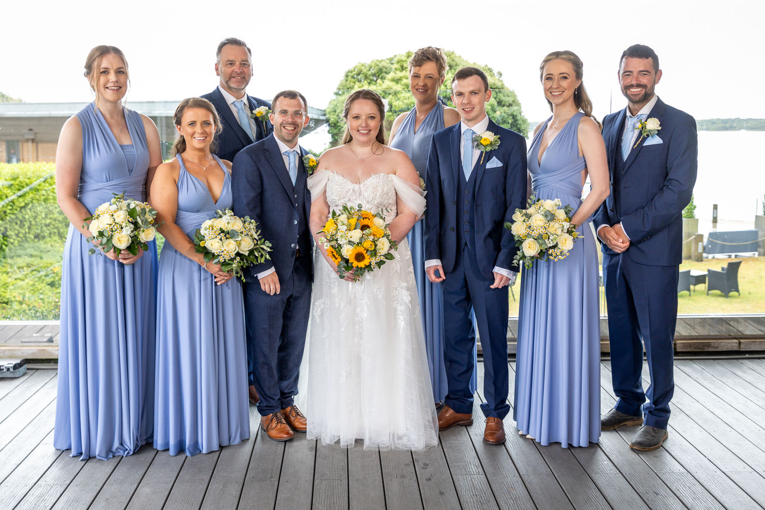 Wedding party with bride and groom by Southampton wedding photographer John Watson