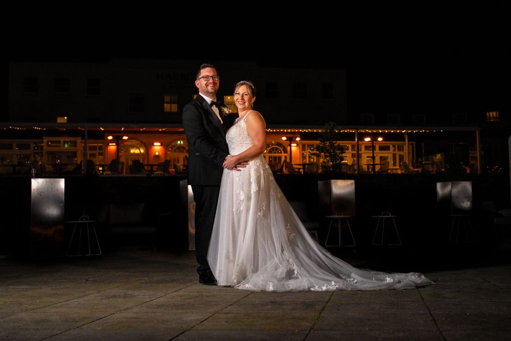 Bride and groom night portrait by Southampton wedding photographer John Watson