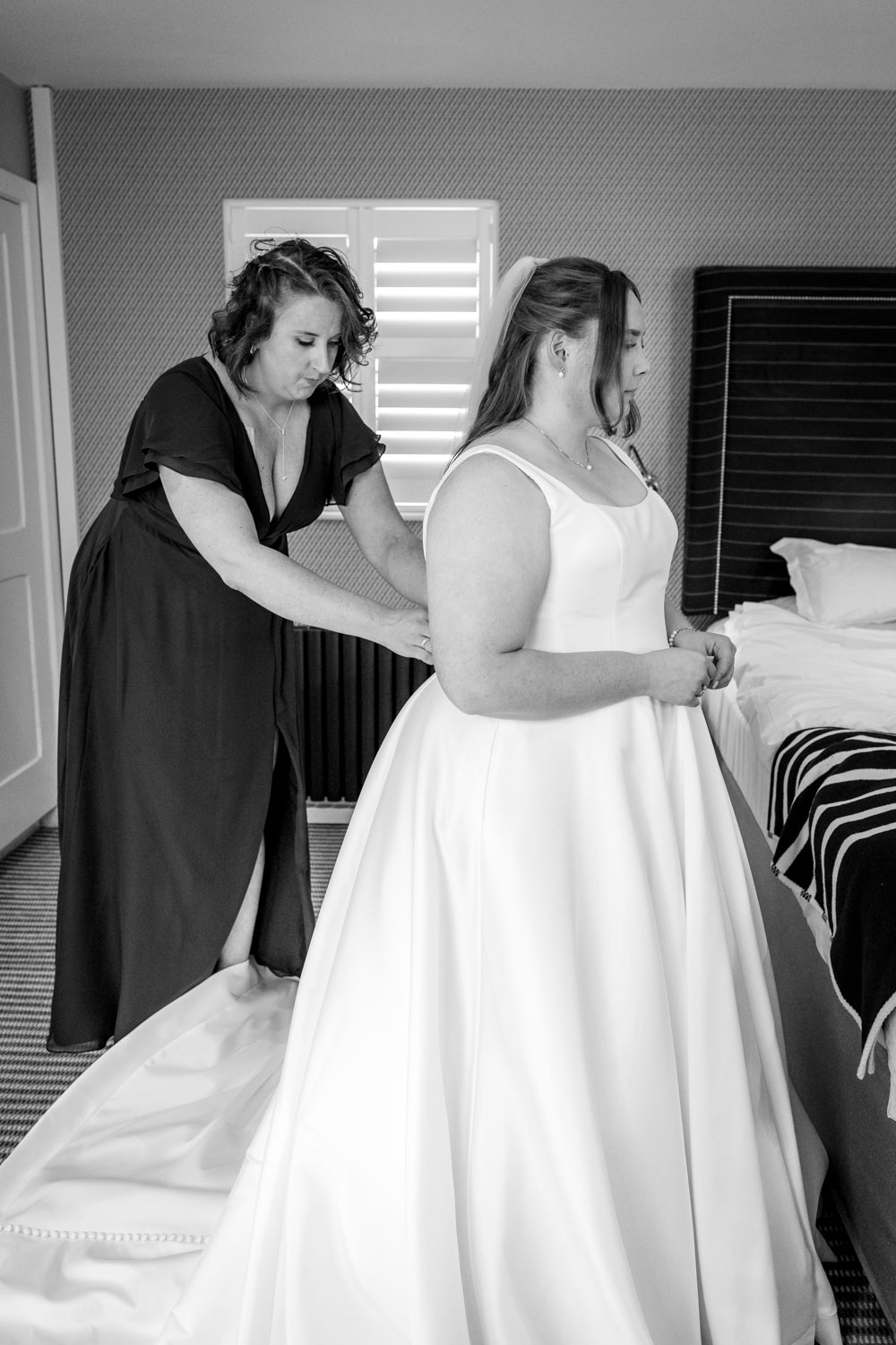 Bride getting ready for her wedding day by Southampton wedding photographer John Watson