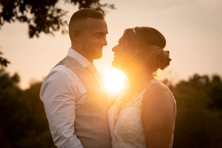Bride and groom at sunset by Southampton wedding photographer John Watson