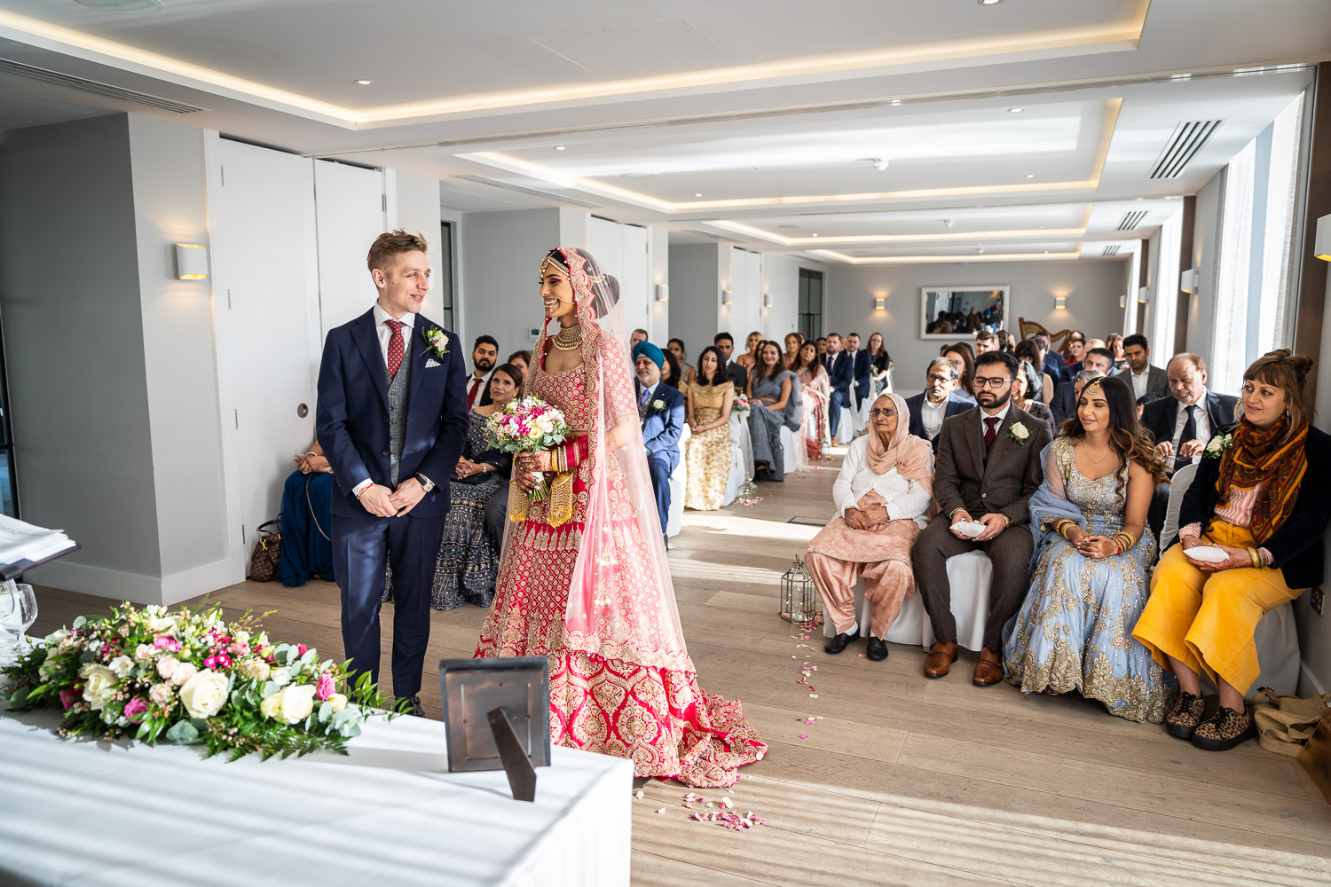 Bride and groom at wedding ceremony venue by Southampton wedding photographer John Watson