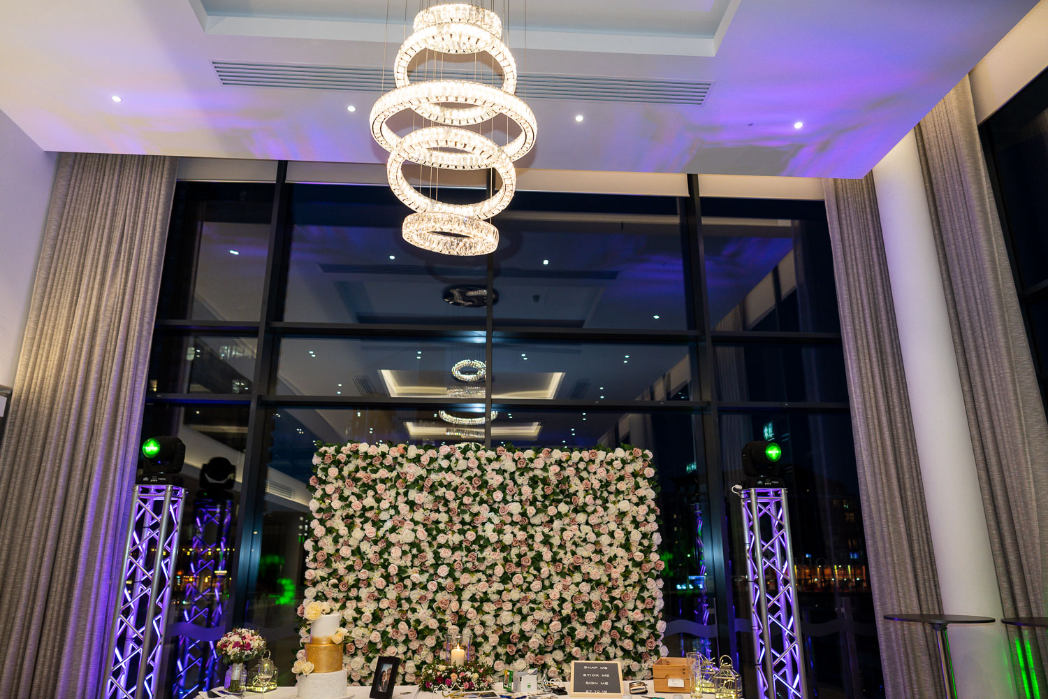 Elegant wedding venue with floral backdrop by Southampton wedding photographer John Watson