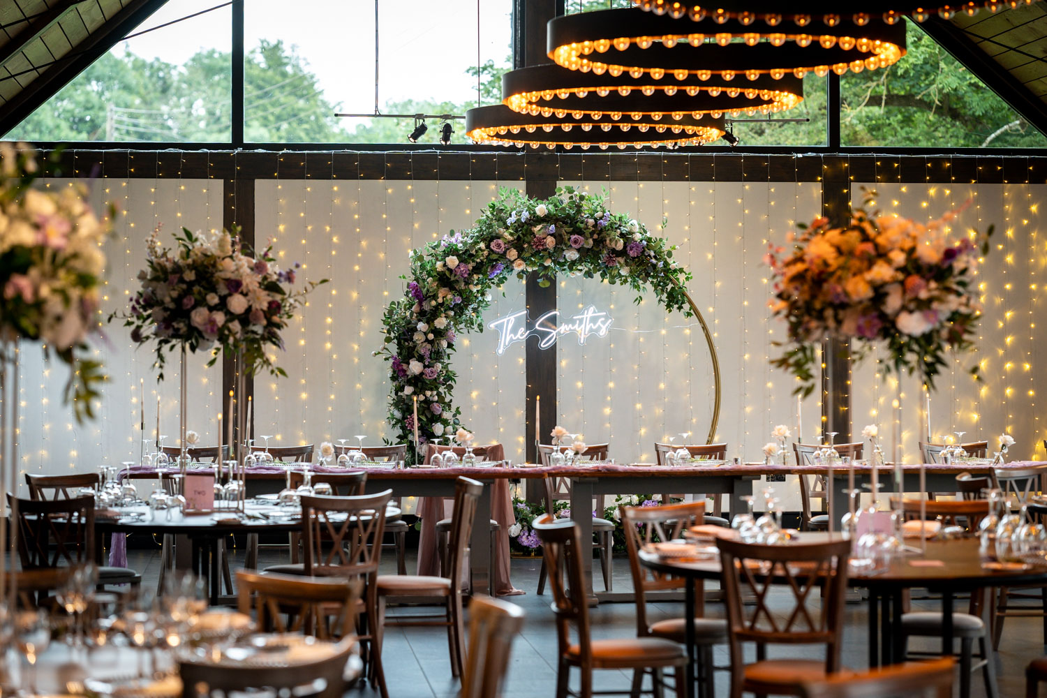 Elegant wedding reception with floral decor by Southampton wedding photographer John Watson
