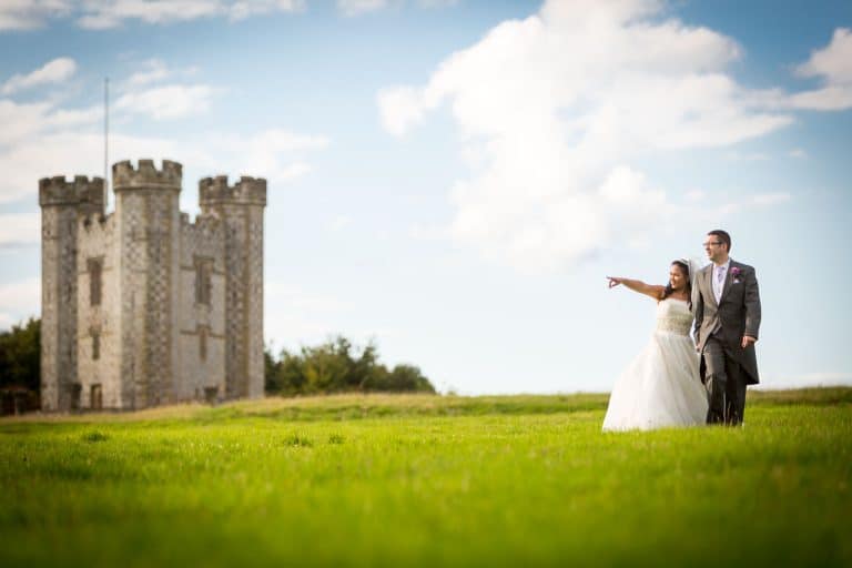 Bride and groom at scenic castle grounds by Southampton wedding photographer John Watson