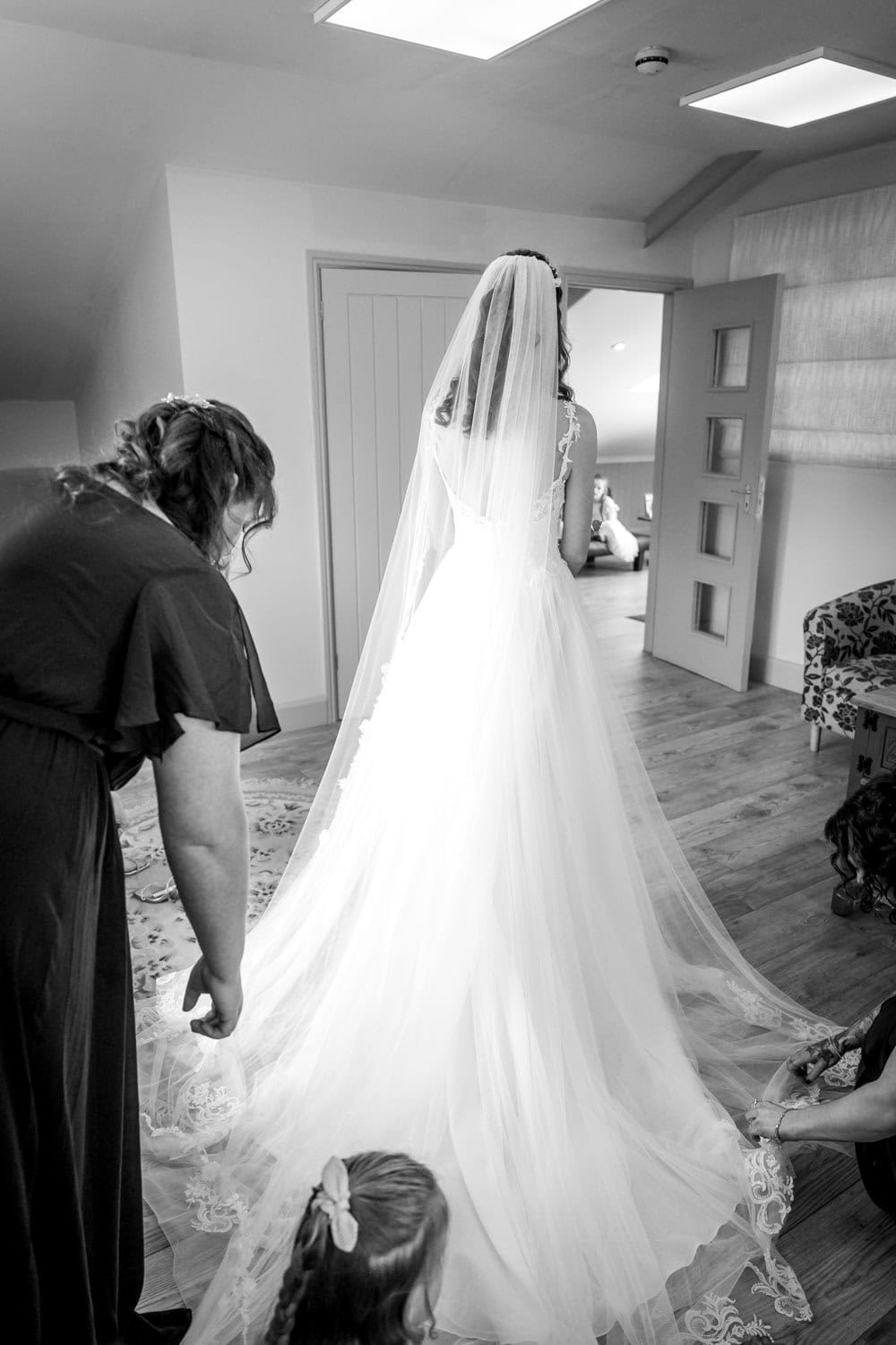 Bride preparing for wedding day by Southampton wedding photographer John Watson