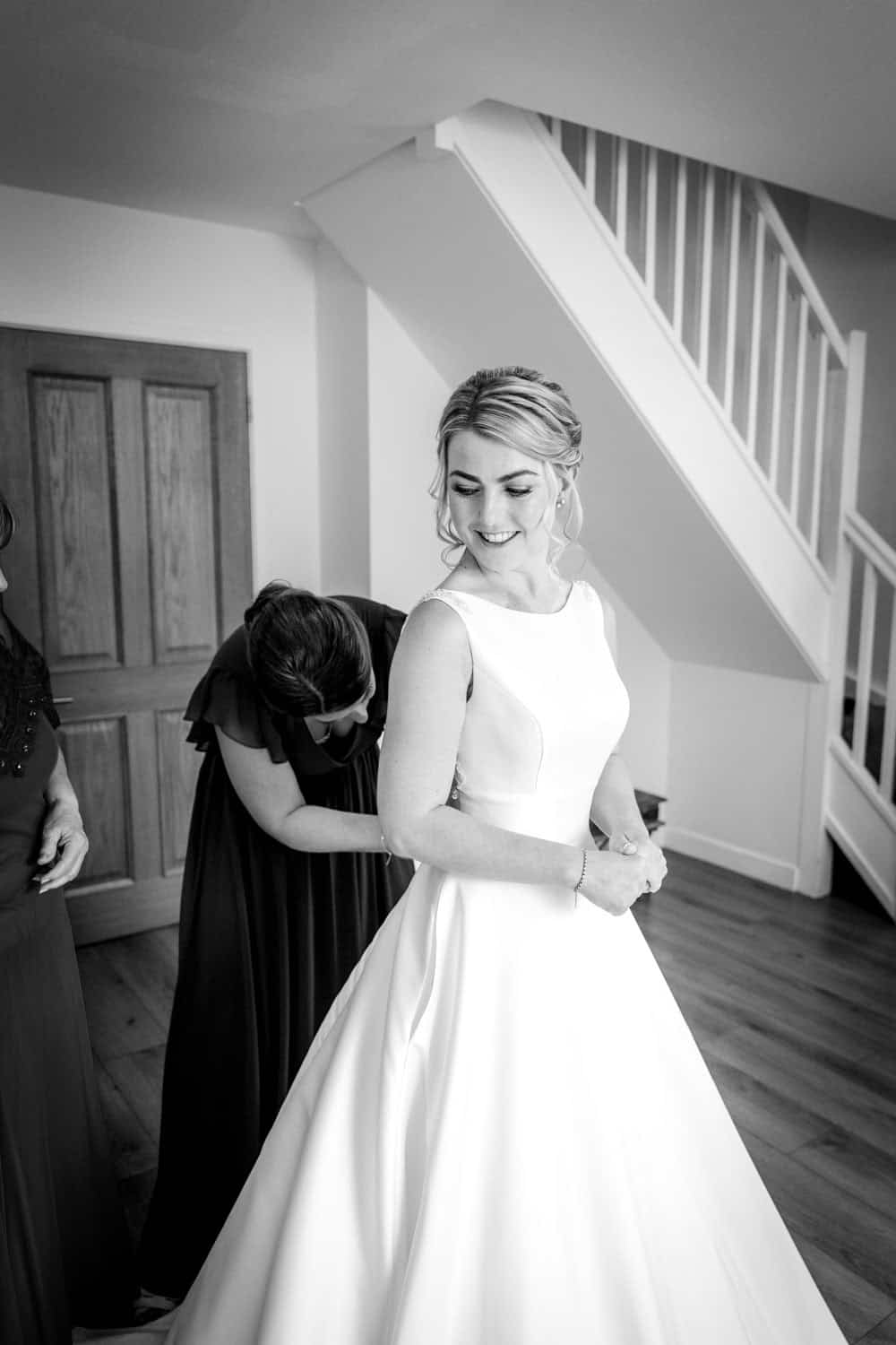Bride getting ready for her wedding day by Southampton wedding photographer John Watson